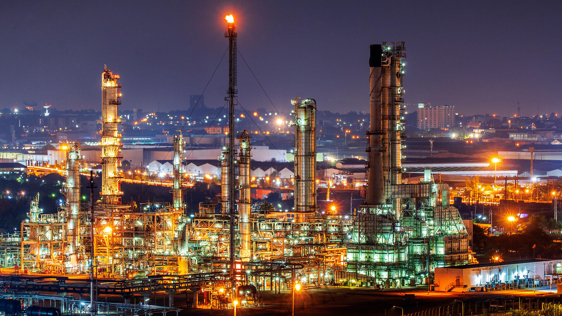 Oil refinery and​ industrial​ city​ After sunset