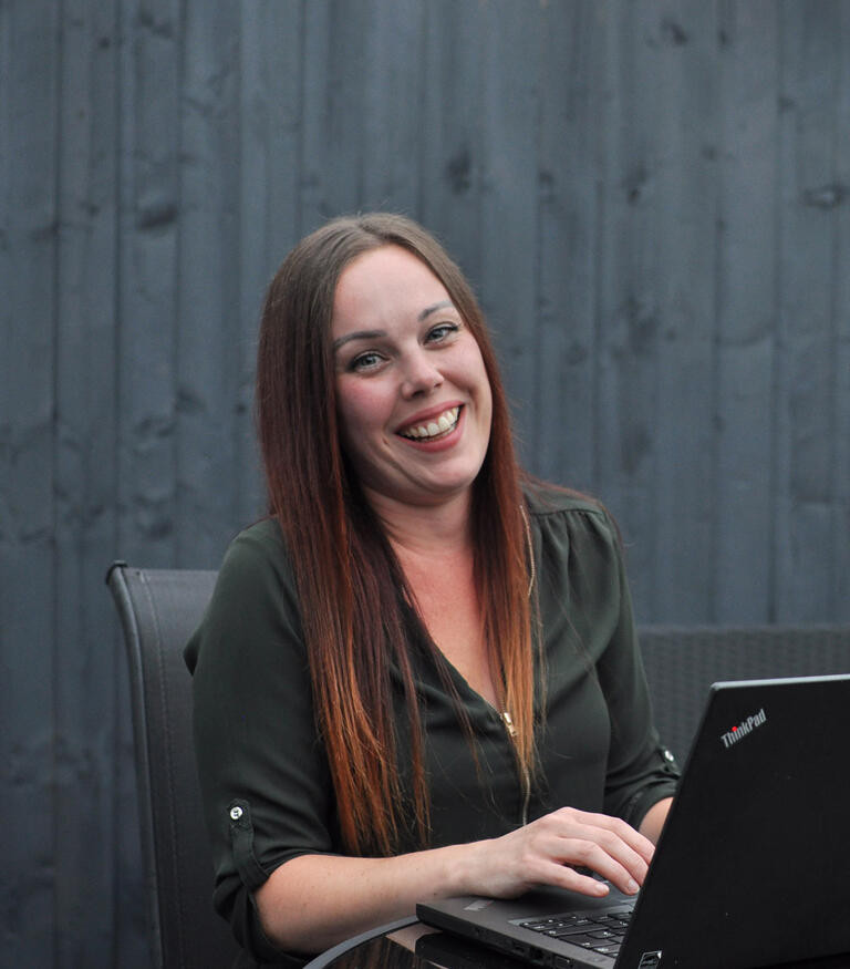 Natalie at her desk