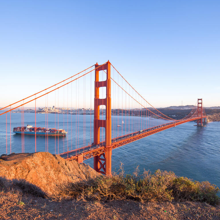 Modern suspension bridge in blue sky