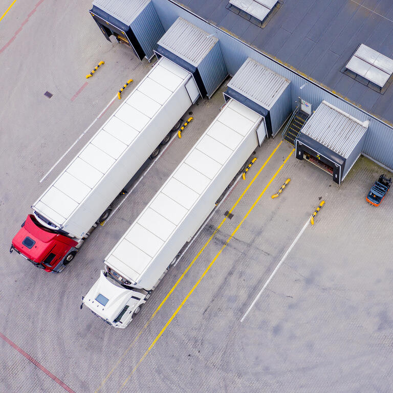 Aerial Shot of Industrial Warehouse/ Storage Building/ Loading