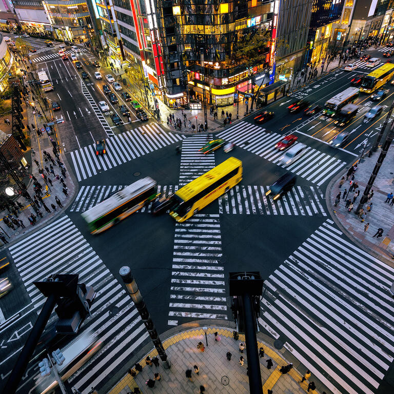 Aerial view of intersection in Ginza, Tokyo, Japan at night.