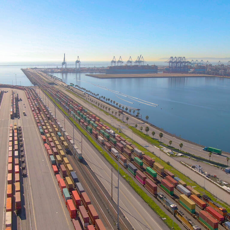 Flying along the busy industrial railway by the Port of Los Angeles