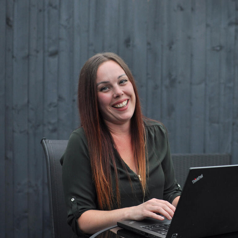 Natalie at her desk